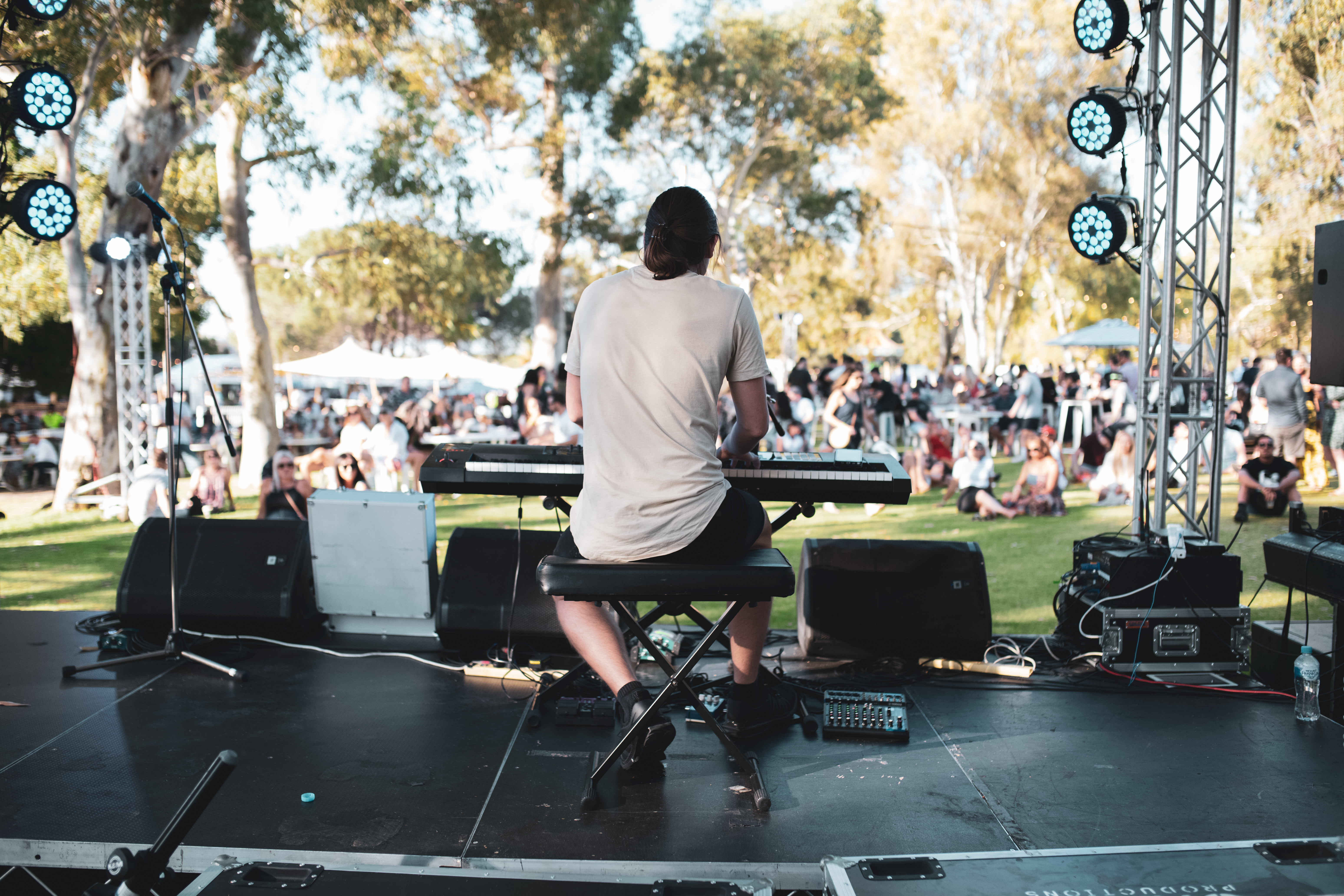 Chilling on the Swan River foreshore at the Beer & Beef Festival, making the most of the weather and the music.