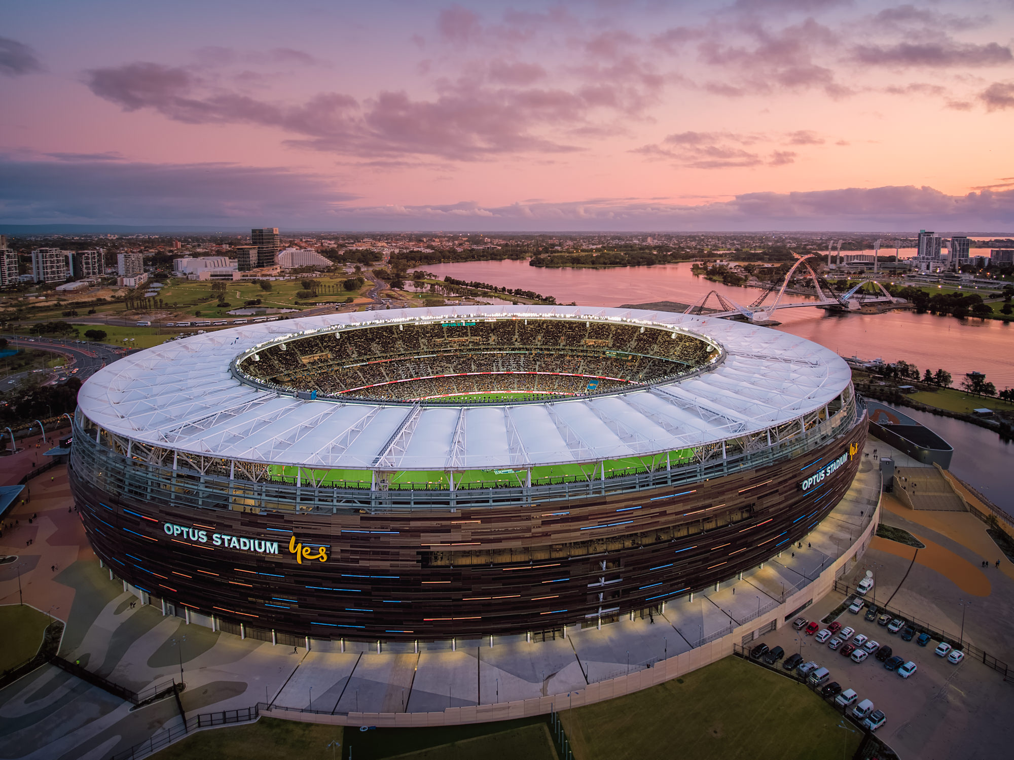 Optus Stadium, the most beautiful stadium in the world, at dusk.