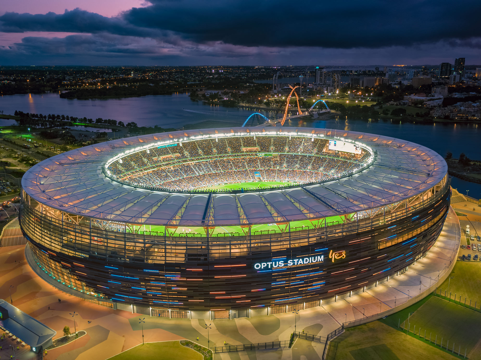 Optus Stadium at night.